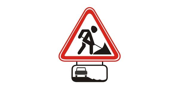 Image: red-edged triangle with a person holding a shovel, above a plate showing a passenger car on scattered dark stones.